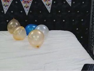 Curvy shakes her boobs for awhile to celebrate her birthday. Then gets naked a rolls around with some balloons before having some wine and putting her dress back on.